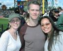 Ashe with friends Todd and Nikki at the Giants game.